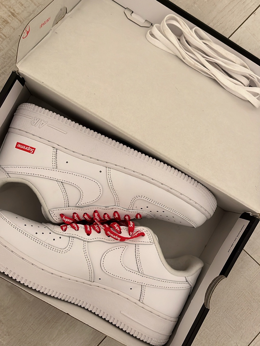 Supreme White Air Force 1s Low